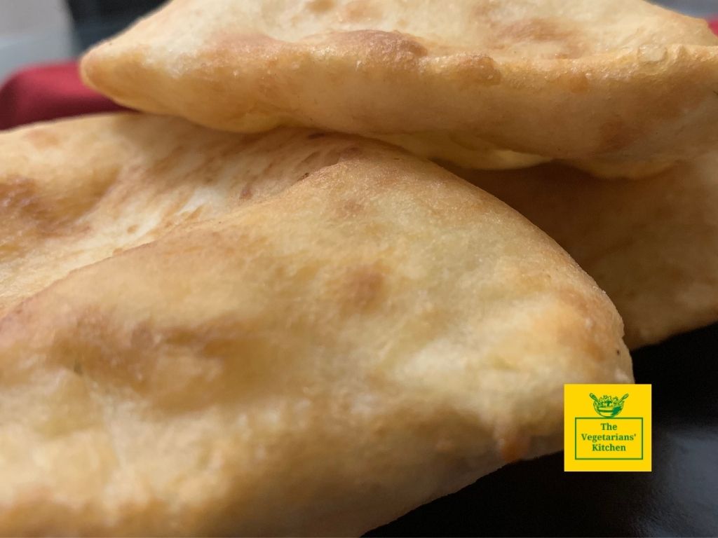 Close up shot of three hojaldres 